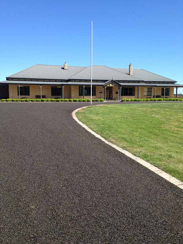 This is a photo of an asphalt driveway which has been installed by 
Mulgrave Surfacing Solutions